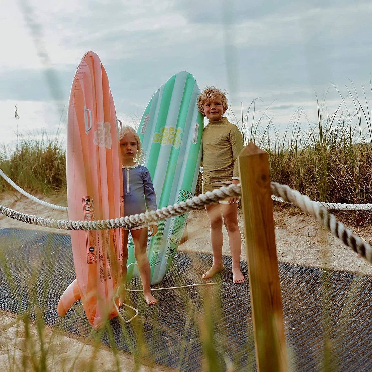 Ride with Me Surfboard Float | Sea Seeker Strawberry