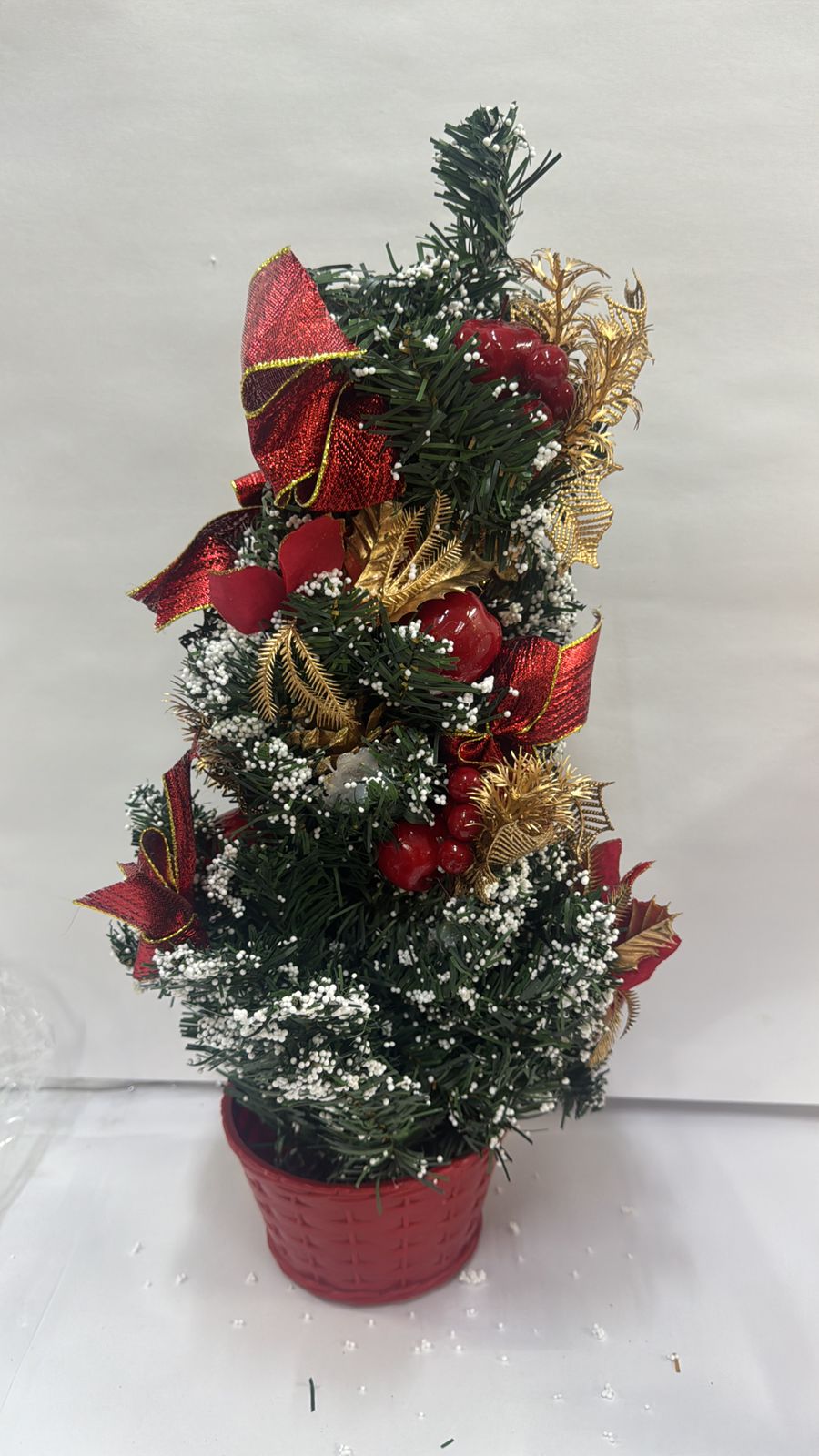 Decorated & Elegant Tabletop Christmas Tree with Red Bows, Berries and Gold Accents