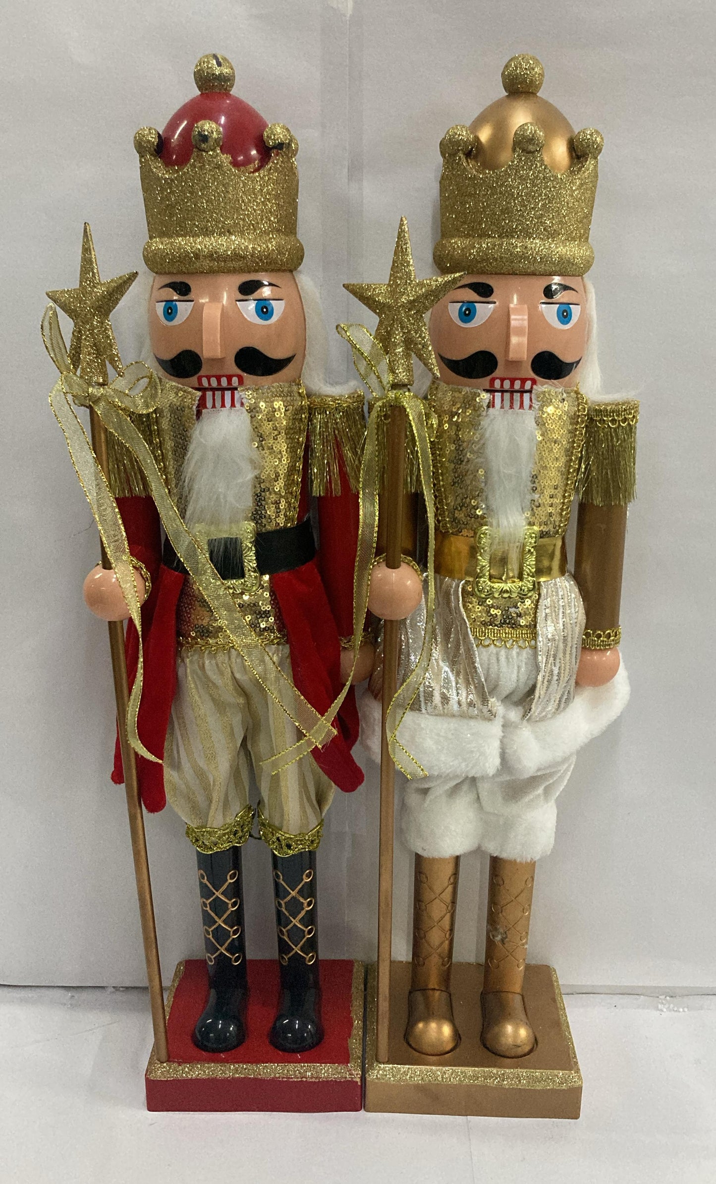 Majestic 2-Feet Christmas Nutcracker King Statue adorned with Glitter, Metallic Accents and Royal Attire – Elegant Seasonal Decor for Homes and Showrooms