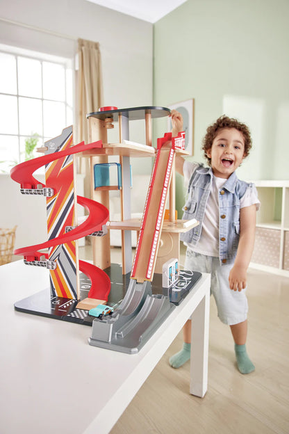 Hape Wooden Gearhead Stunt Garage Car Track Set with Loop Track, Ramps & Lift | Kids Racing Toy