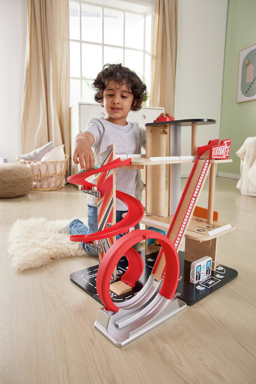 Hape Wooden Gearhead Stunt Garage Car Track Set with Loop Track, Ramps & Lift | Kids Racing Toy