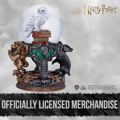 Hedwig Harry Potter Snow Globe with Hogwarts House Emblems Magical Collectible Piece