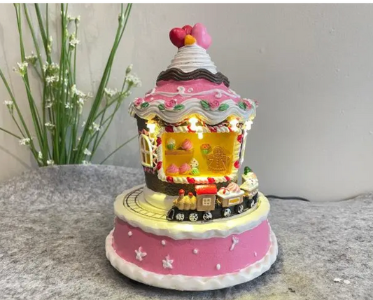 christmas cupcake town with rotaing train