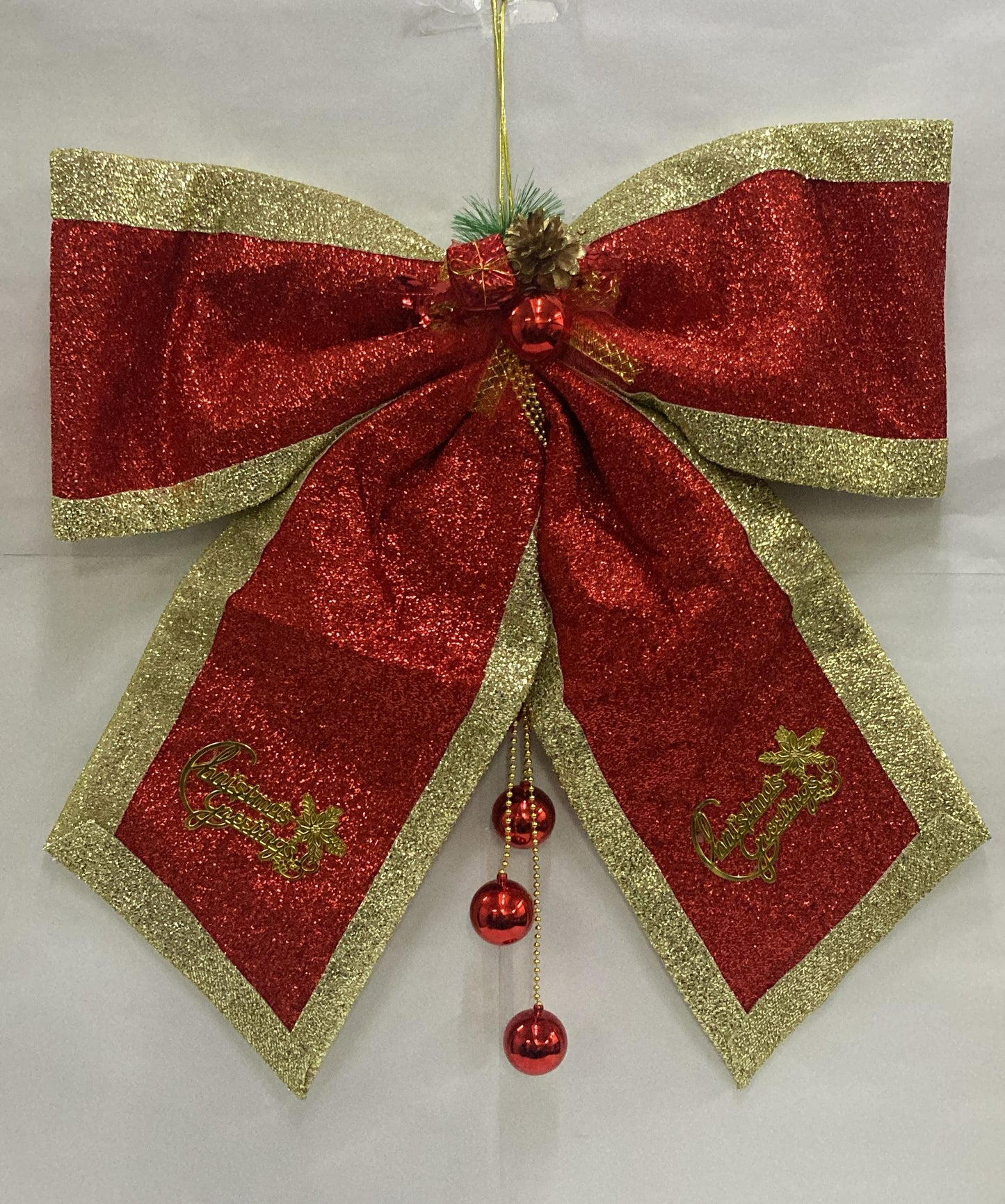 Grand 2-Feet Oversized Christmas Bow in Sparkling Red with Gold Trim and Hanging Baubles – Elegant Holiday Accent for Home & Event Décor