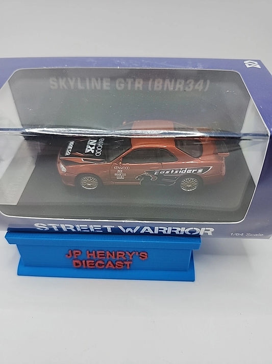 1:64 Street Warrior Skyline GTR (BNR34) Orange Kenwood Eastsiders